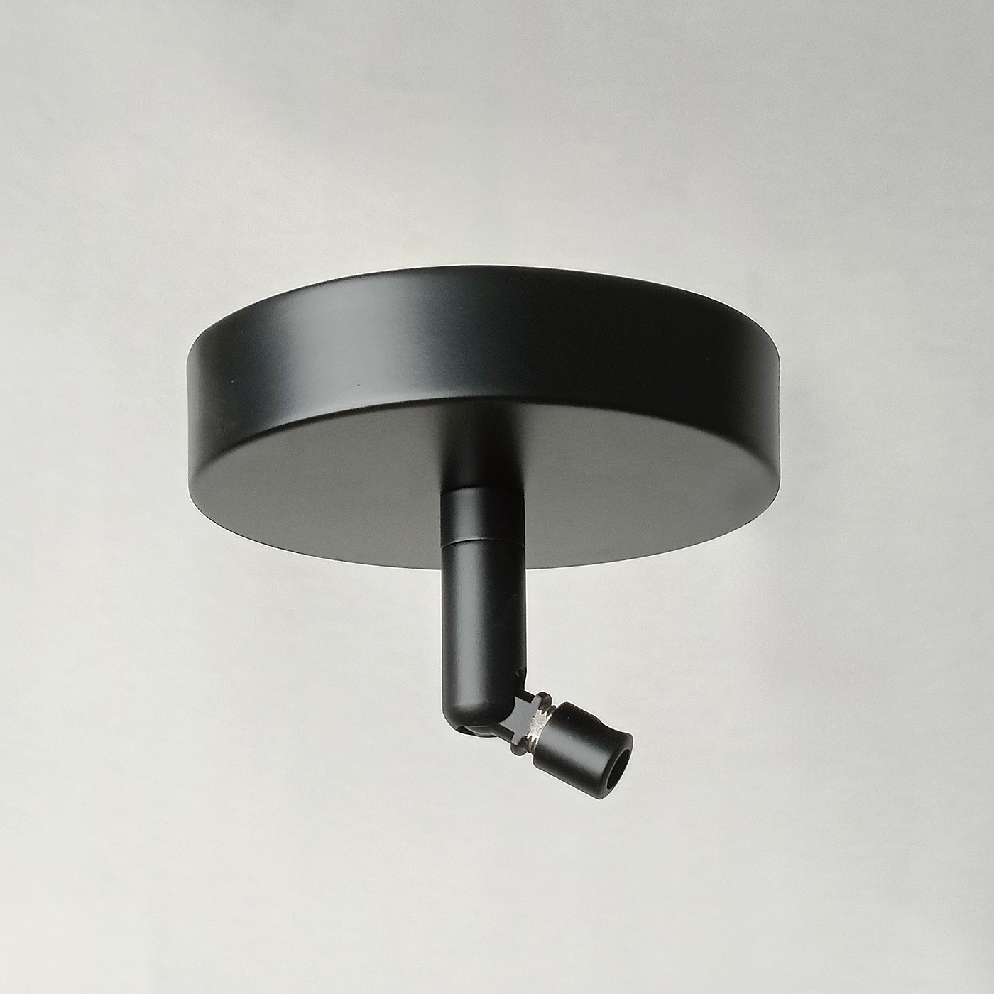 Ceiling rose for sloped ceilings