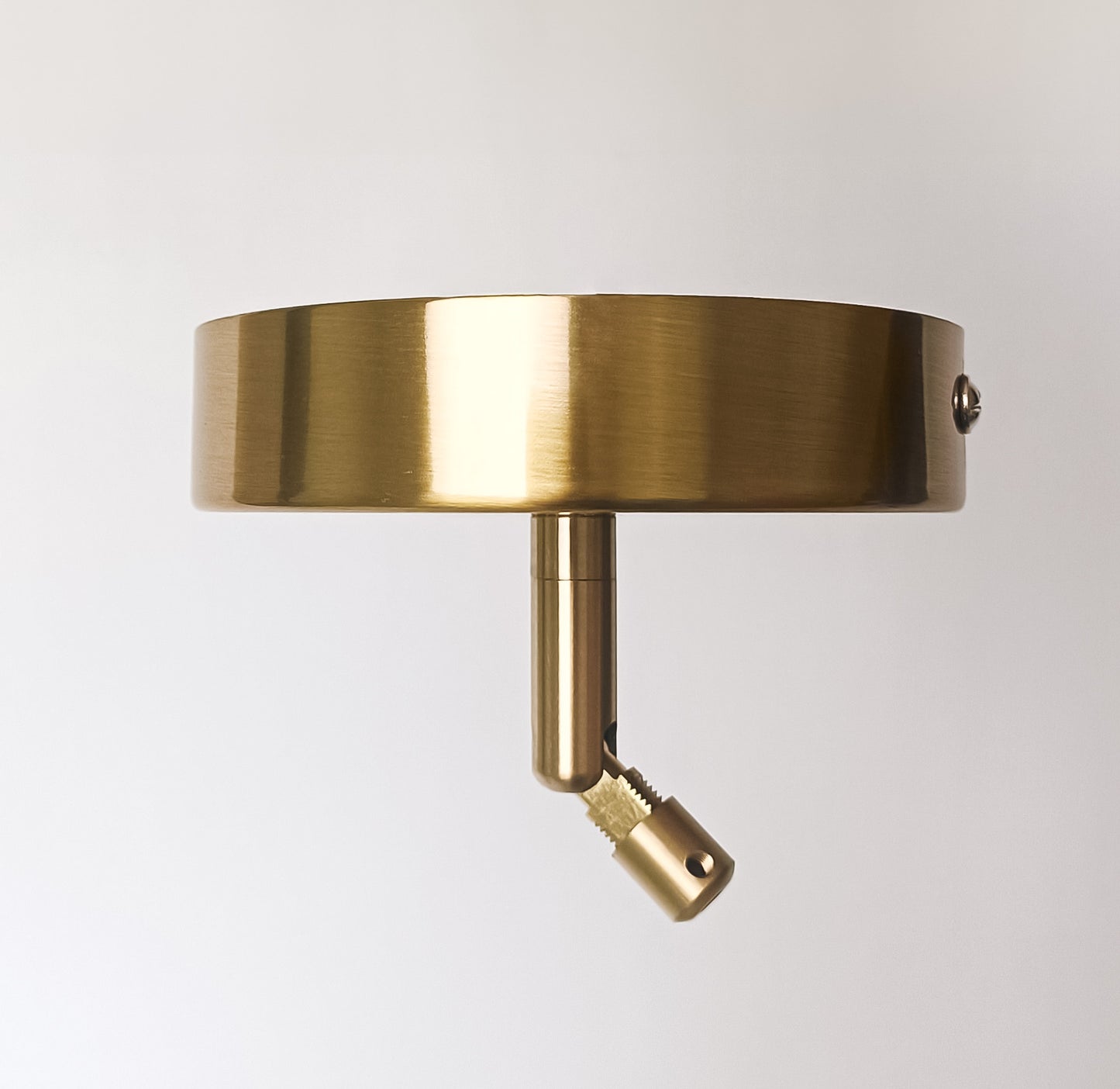 Ceiling rose for sloped ceilings