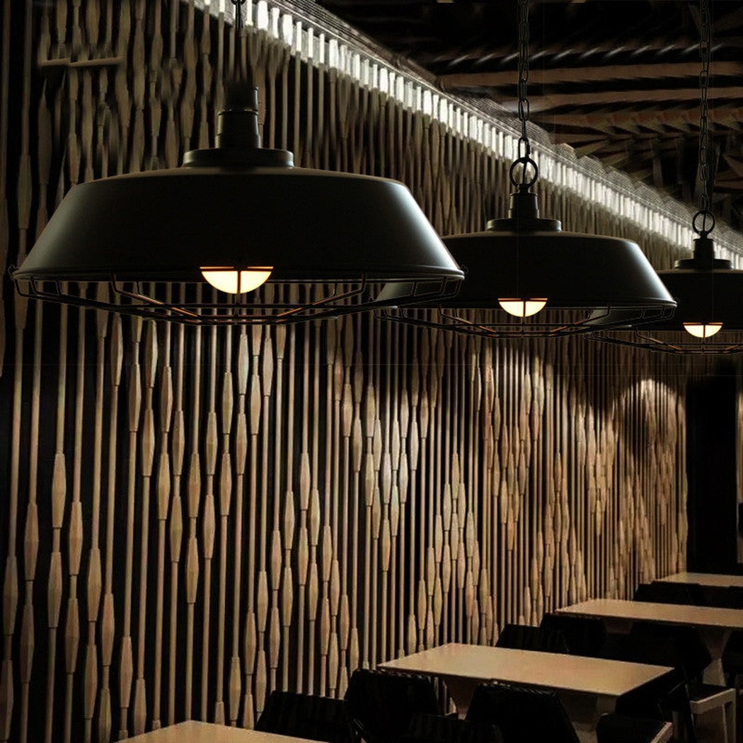 Vintage Industrial Pendant Light With Cage Covering black - restaurant setting