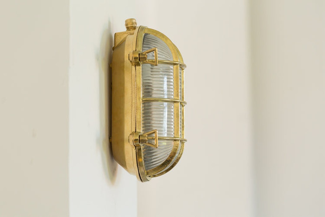 Nautilus Oval brass cage outdoor wall light / ceiling Light