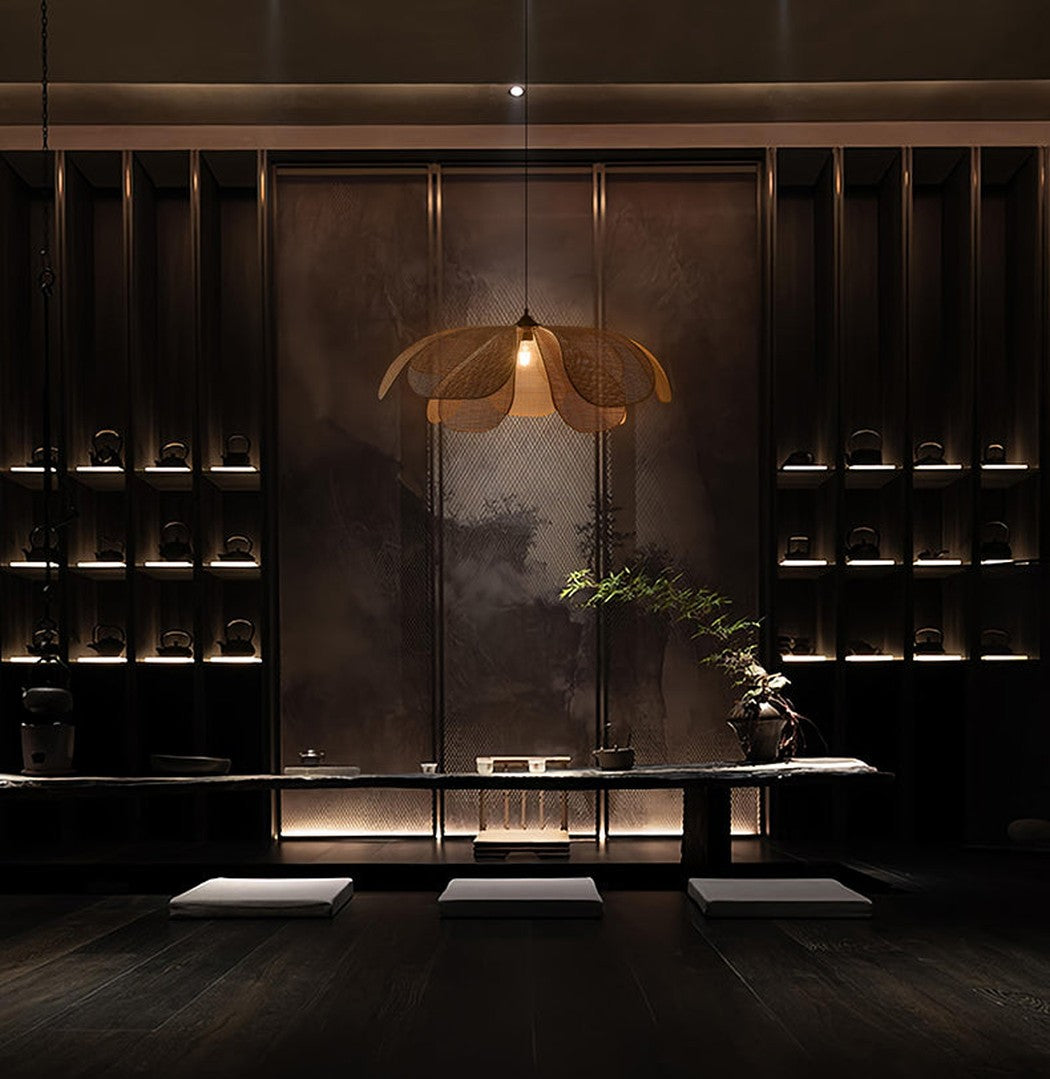 Cefalu Rattan Petals Pendant Light installed in dimly lit moody restaurant with oriental feel