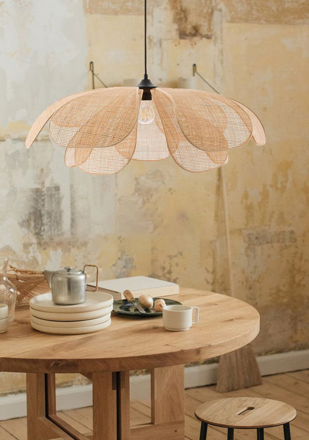 Cefalu Rattan Petals Floral Pendant Light installed in artist's residence