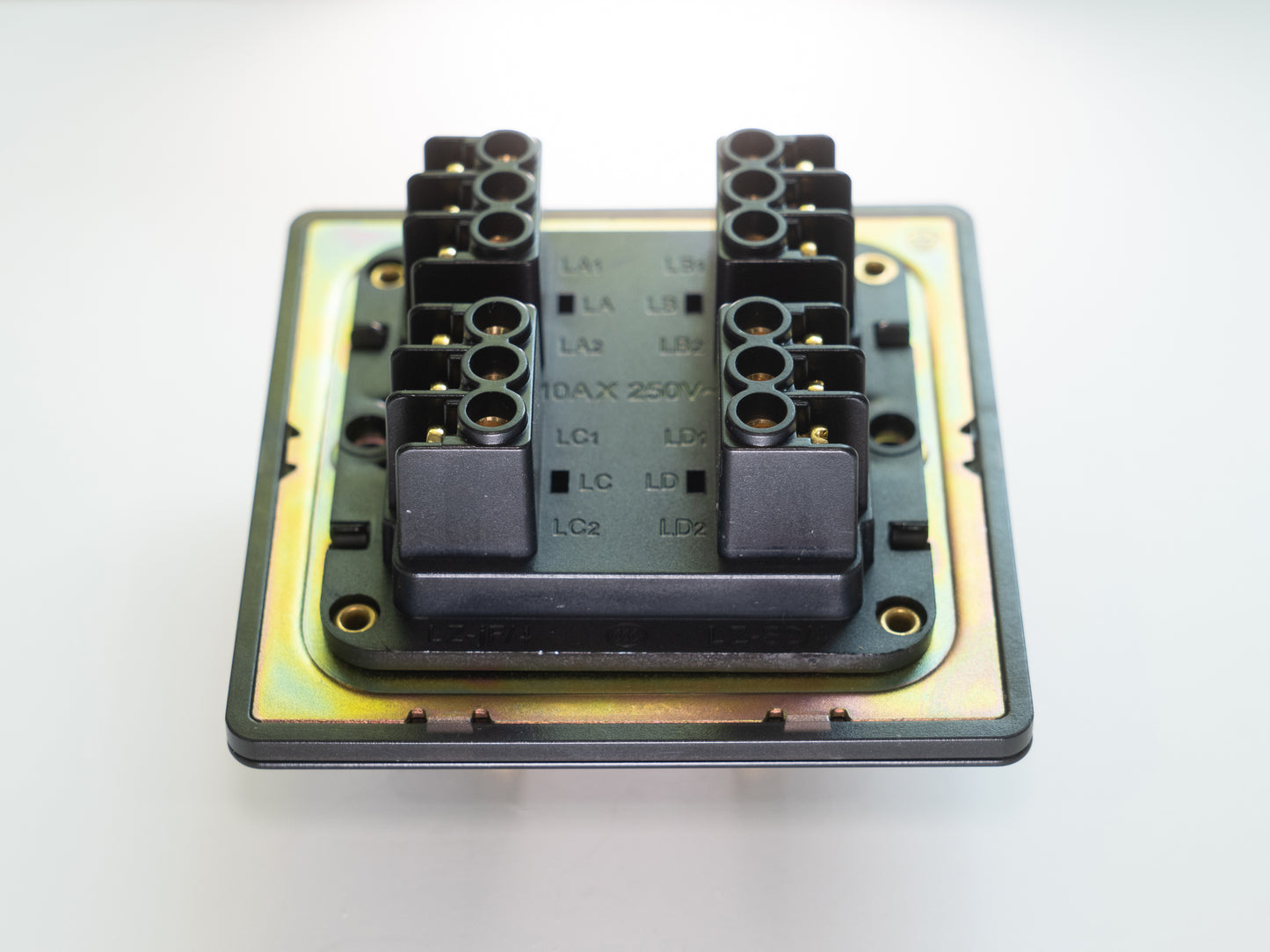 Paddington Knurled 4 gang quad flip light switch - in black and brass