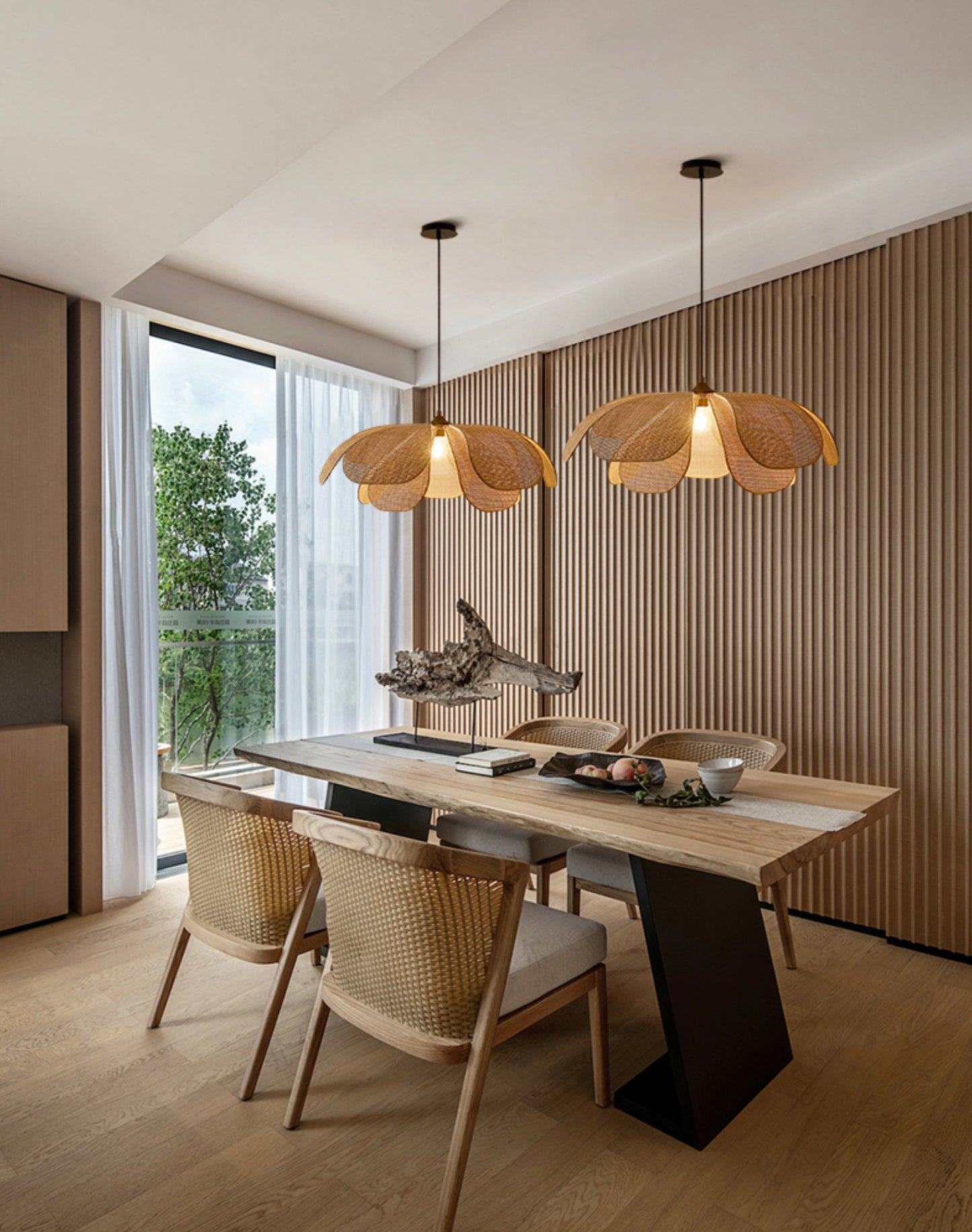 Cefalu Rattan Petals Floral Pendant Light installed in scandi style all wooden dining room