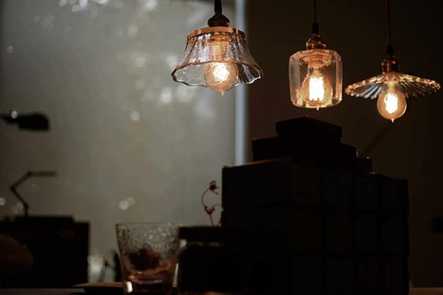 Petunia glass mid century pendant light in use - dark room