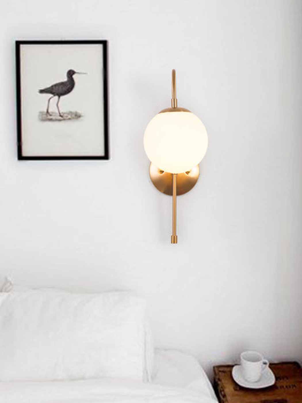 Frosted glass ball gooseneck wall light - in room setting
