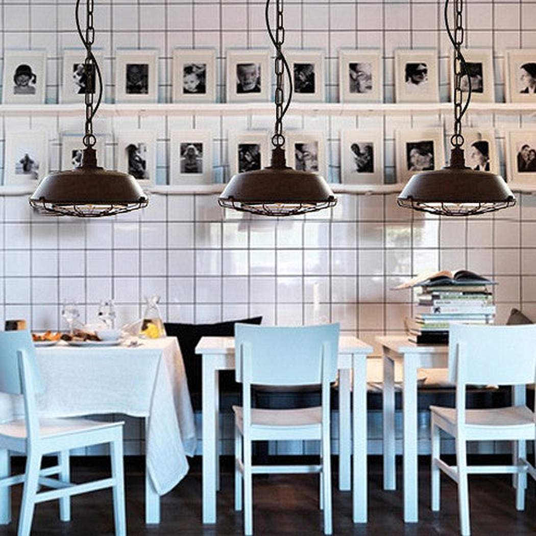 Rustic Vintage Industrial Pendant Light With Cage Covering in cafe