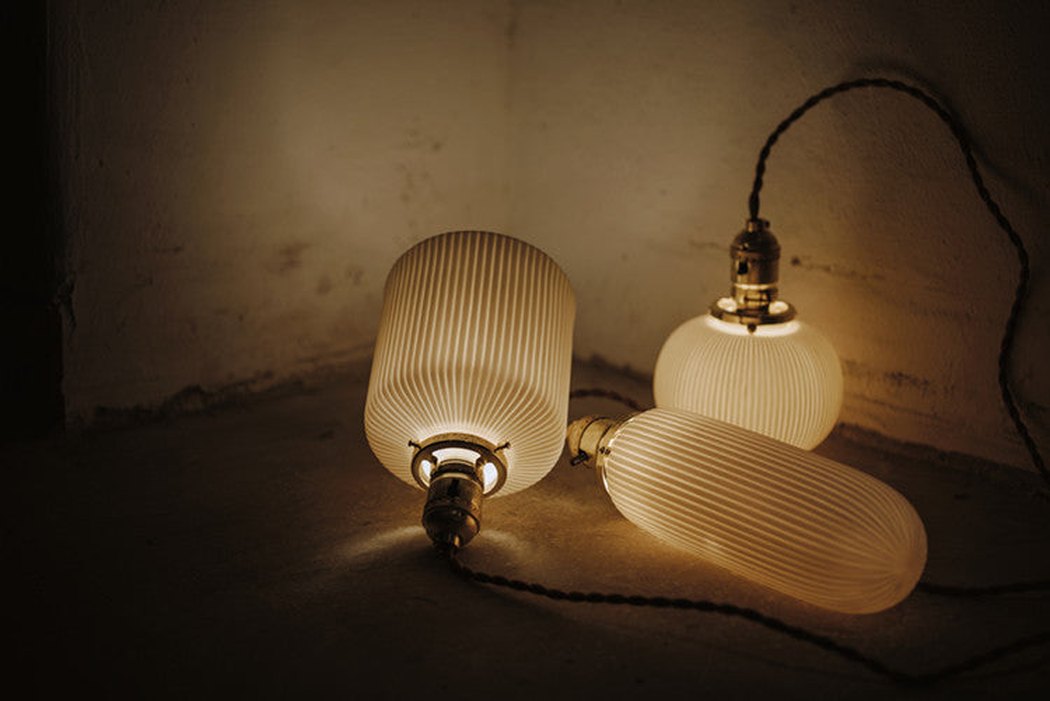 art deco ceramic pendant light trio lit
