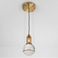 Opal round glass suspended sphere midcentury pendant Light studio image