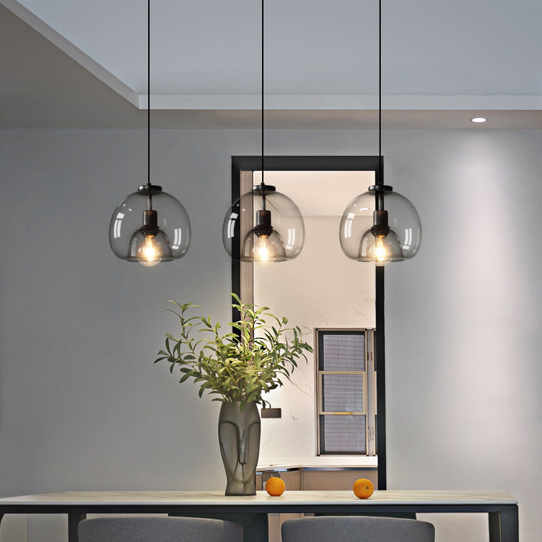 Enzo minimalist curve tinted glass shade pendant light dining room setting