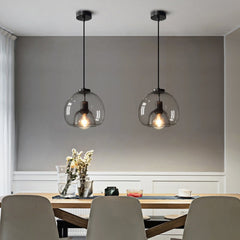 Enzo minimalist curve tinted glass shade pendant light dining room setting