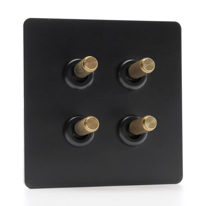 Paddington Knurled 4 gang quad flip light switch - in black and brass