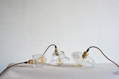 Petunia glass mid century pendant lights on table