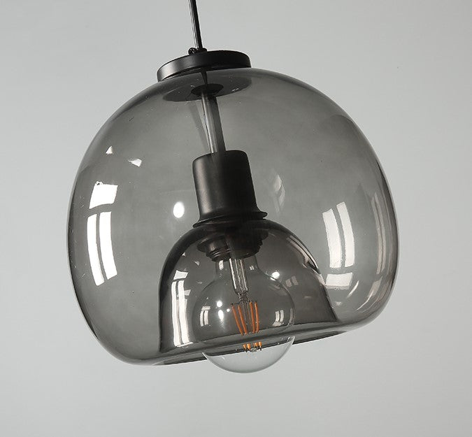Enzo minimalist curve tinted glass shade pendant light off on angle