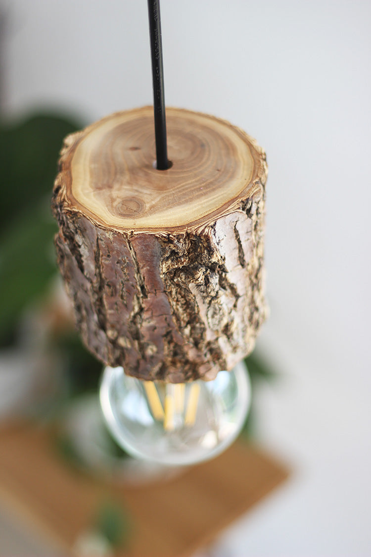 Woodpecker timber stump pendant llght
