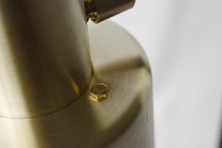 brushed brass pendant Light close up screws