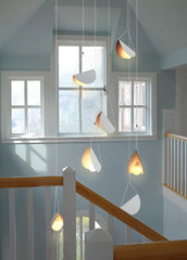White glider pendant light chandelier room setting