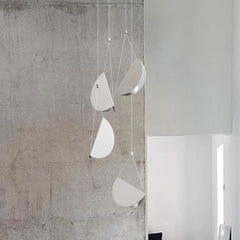 White glider pendant light chandelier room setting
