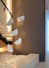 White glider pendant light chandelier room setting