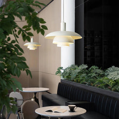 Otago white mid century modern pendant light in stylish restaurant setting
