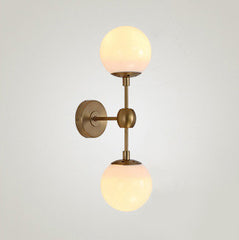 Brushed brass frost bulb wall light sconce